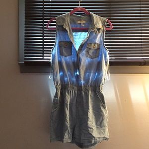 Lightweight denim romper with pockets.